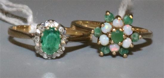 9ct gold emerald and diamond cluster ring and a similar emerald and opal cluster ring